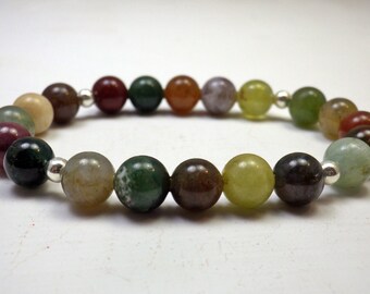 Elastic bracelet with jade beads and silver beads