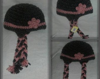 Beautiful hat with braids and flower