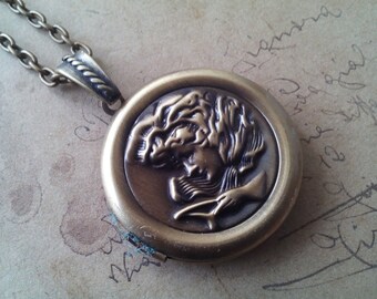 Locket necklace ~ woman's head ~ ~ bronze ~.