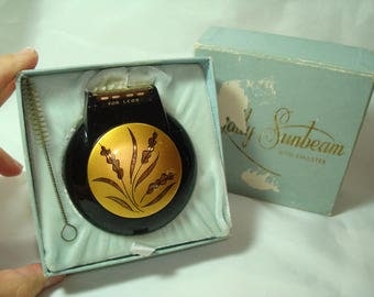 LADY SUNBEAM Vintage SHAVEMASTER Round Black and Gold Electric Shaver.