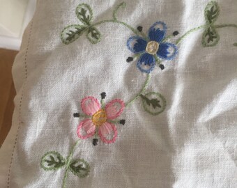 A small, pretty, vintage hand embroidered tray cloth.