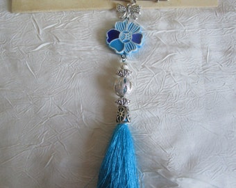 Broche métal argenté et céramique