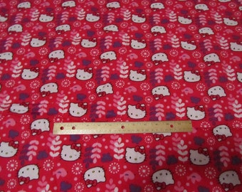 30 Inches Hot Pink Flowered Hello Kitty Faces Flannel Fabric