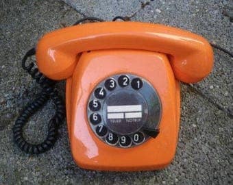 vintage orange rotary phone from 70s also aivailable in green
