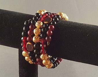 Black, red, and gold memory wire bracelet