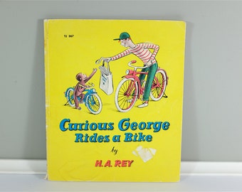 curious george rides a bike 1952