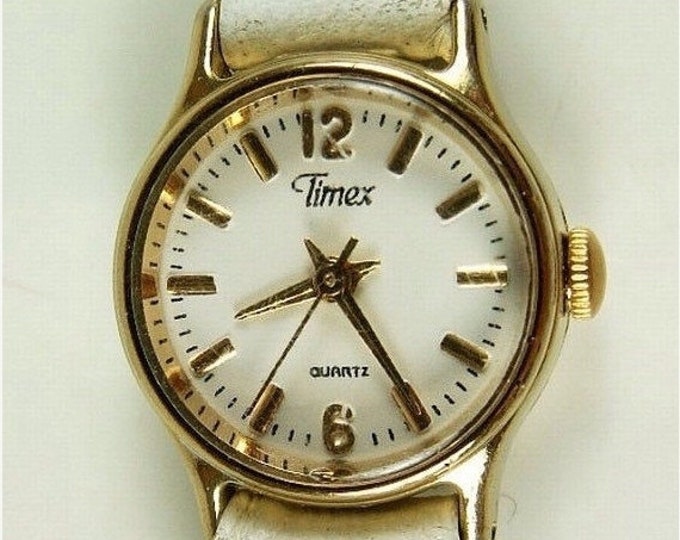 Storewide 25% Off SALE Vintage Gold Tone Bezel Quartz Designer Timex Wrist Watch Featuring White Face With Original White Leather Band