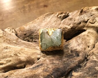 Wooden and aquamarine ring with gold leaf.