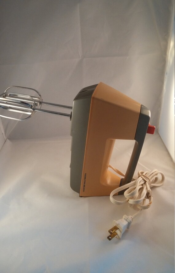 Vintage Hamilton Beach hand mixer mustard and brown colored