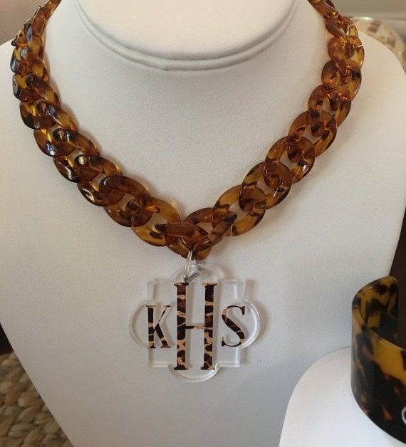 Tortoise shell acrylic necklace with quatrefoil monogrammed pendant