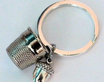 Thimble and Acorn Hidden Kisses Key Ring Silver Metal Peter Pan and Wendy
