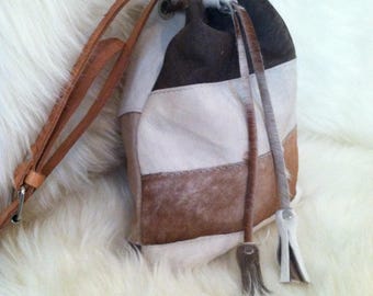 Cowhide Cinch Cross Body Sling Bags