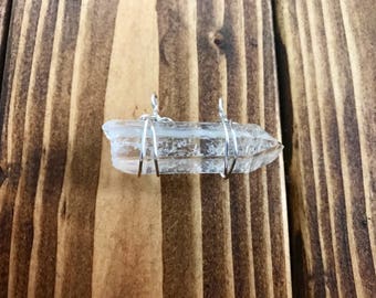 Clear quartz point wire wrap pendant
