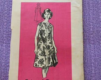 Vintage 1950's - Knee length dress, uncut. Bust 42"
