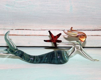 Shades of teal glass mermaid sculpture