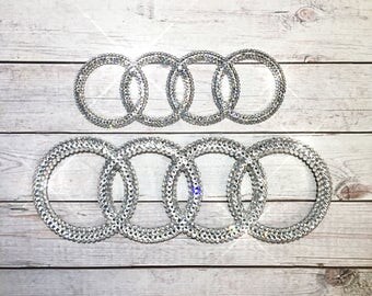 Bling car emblem- sparkly auto emblems- bling auto parts- bling car logos- bling audi logo- bling car accessories- custom car accessories-