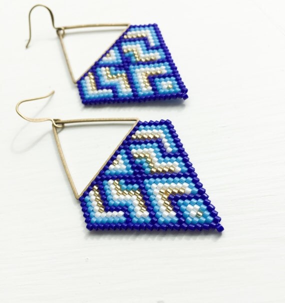 Items similar to The Blue Dog Beaded Earrings Blue White Gold Beaded