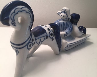 horse and sleigh figurine