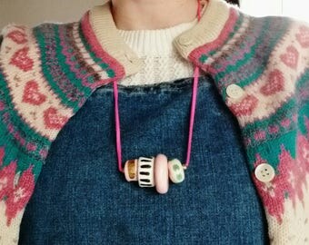 Dreamy hand made unique ceramic beaded necklace in pinks, polka dots stripes and real gold lustre.