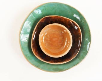 Urban rustic pottery bowls set glazed in aqua and earthy browns ceramic nesting bowls organically shaped