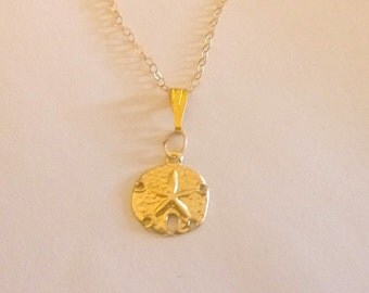 Authentic 20 inch 14 K Gold Chain with 14 mm Sand dollar Starfish pendant