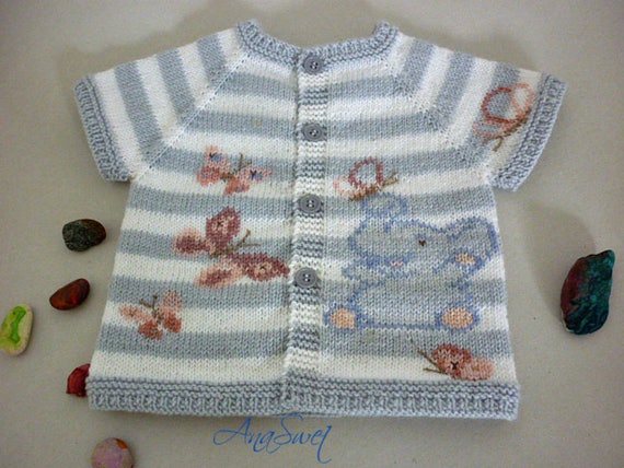 Hand knit baby vest .Baby vest with elephant and butterflies.