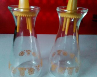 Pyrex Salt and Pepper Shakers , Butterfly and Flower design