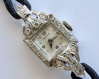 Vintage Retro Birks Platinum Diamond Swiss made Watch with 17 Jewels and Mechanical Movement. Circa 1940's -50's