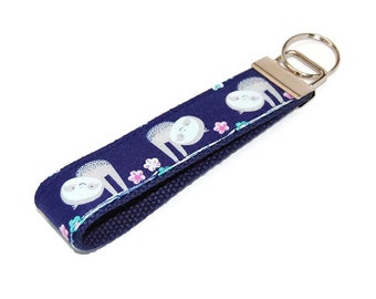 Sloth Keychain on Navy Blue Fabric Key Fob Wristlet