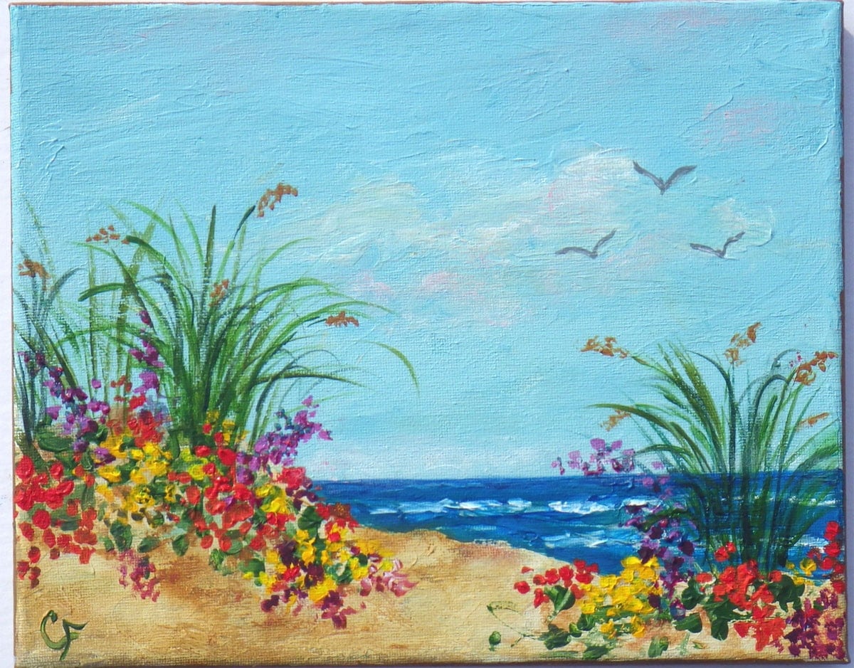 Tropical beach art colorful flowers on sand dunes bright