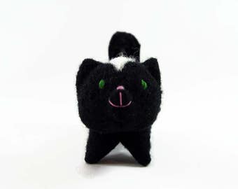 Waldorf toy, toy skunk, waldorf animal, stuffed animal, stuffed toy, ecofriendly toy, felted animal, wool toy,