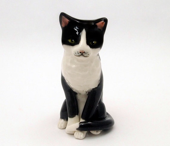 black and white ceramic cat figurine