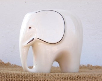 white porcelain elephants
