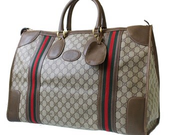 used gucci luggage for sale