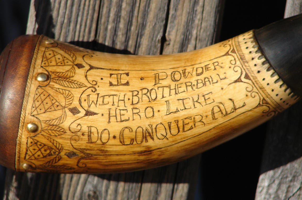 Small scrimshaw decorated powder horn