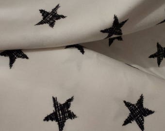 Ecru star fabric, black star fabric, ecru jersey fabric, stretch fabric sold per half metre, childrens fabric, star jersey fabric