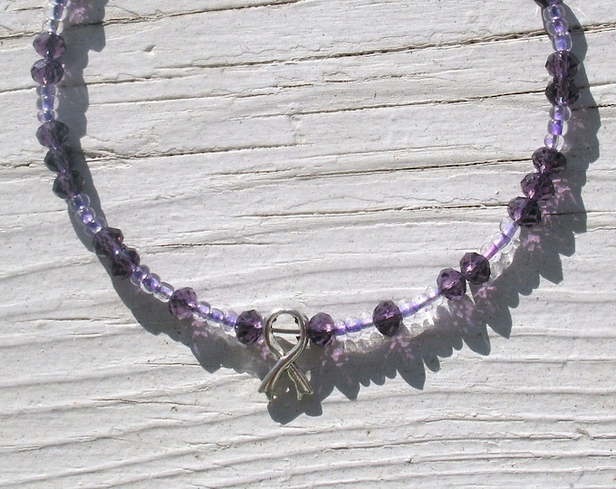 Purple Cancer Awareness, silver ribbon charm, light purple seed beads, purple rondelle crystal beads, memory wire, stackables, affordable