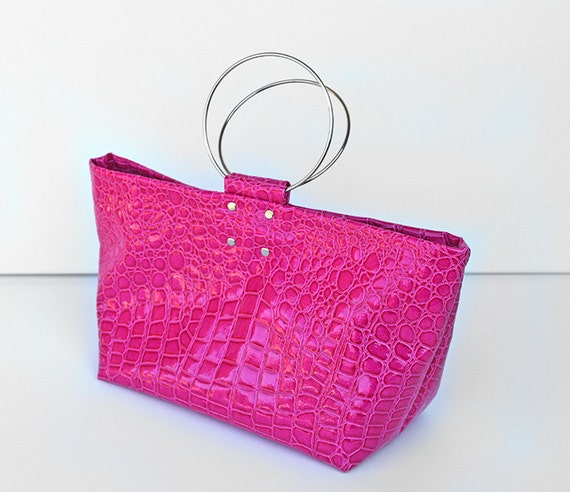 pink alligator purse