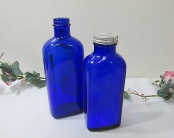 Cobalt Blue Glass Medicine Bottles Set of 2 One has Metal Lid