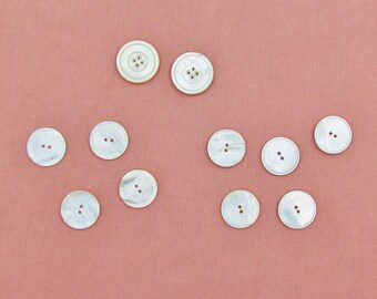 Lot of large mother of pearl buttons, 11 sew through buttons in 3 styles