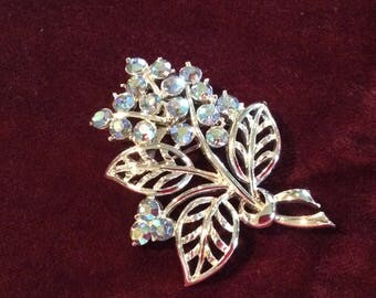 Vintage brooch silver metal flower shape aurora Borealis rhinestones
