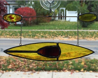 Kayak #1 Stained glass suncatcher hanging from silver steel chain
