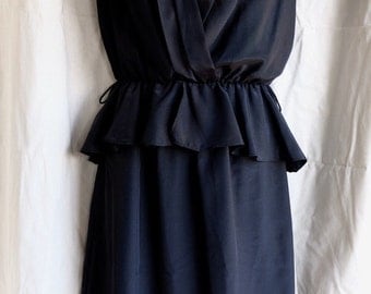 Black 1980s Peplum dress
