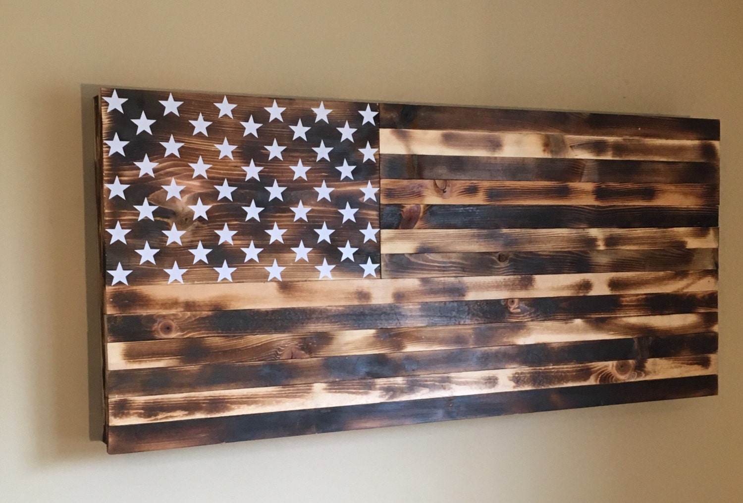 Burnt American wooden flag hidden gun cabinet secret