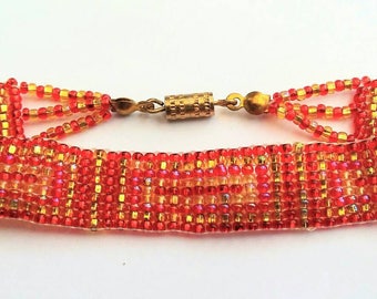 Red and gold seed bead friendship stlye bracelet
