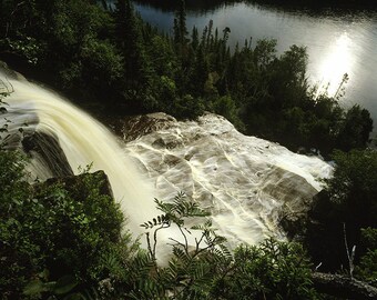 Falls of Ruisseau Saint-Pancrace # 1 coming in Saint-Lawrence River at Anse Saint-Pancrace near Baie-Comeau, Côte-Nord