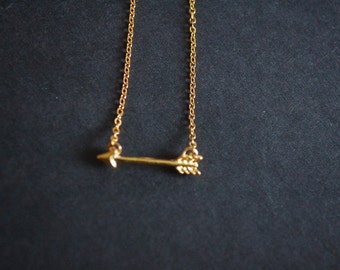 gold tone cupid's arrow necklace