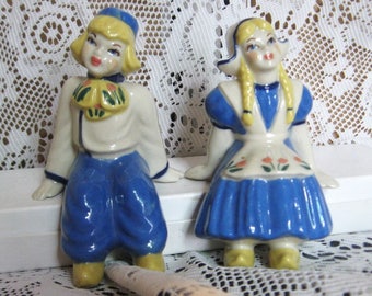 Dutch Girl and Boy Sitting Figurines - Ceramic Arts Studio - Madison Wisconsin
