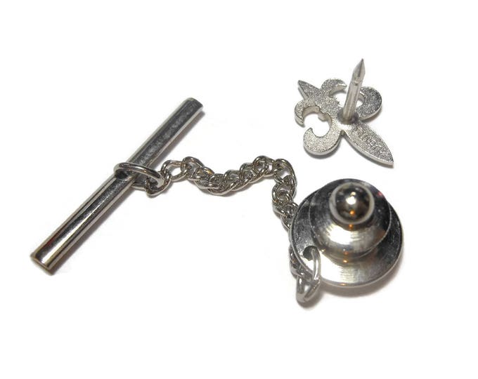 Swank Fleur-de-lis tie tack, flower of the lily, silver tie tac pin, use to represent French royalty, signifys perfection, light, and life