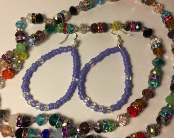 Unique Hand Wired, Lavender Beads, Sterling Silver ear wires. Picture doesn't do justice, very pretty.